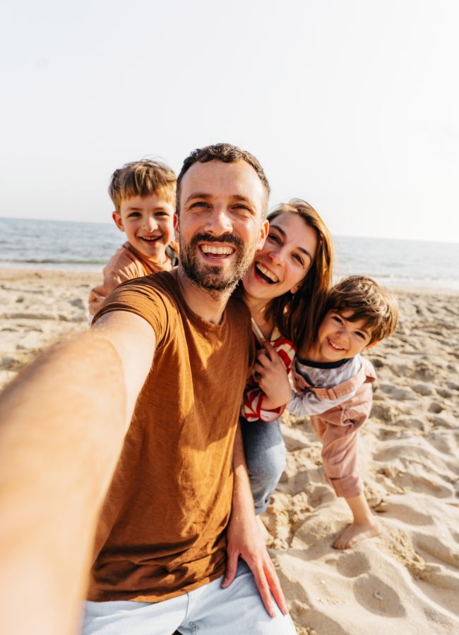 Family beach selfie